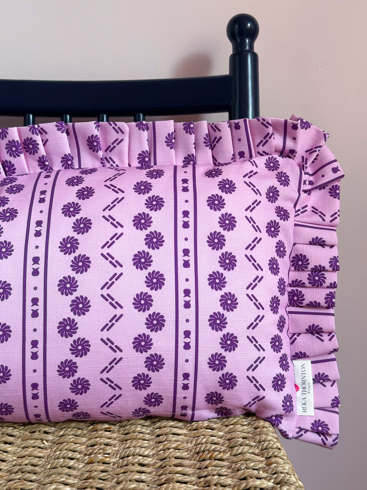 Purple frilly edge cushion 