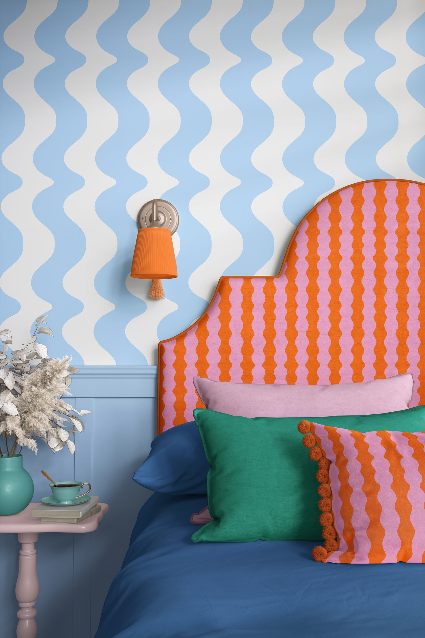 Bedroom with orange and pink striped headboard against a blue and white wavy wall.